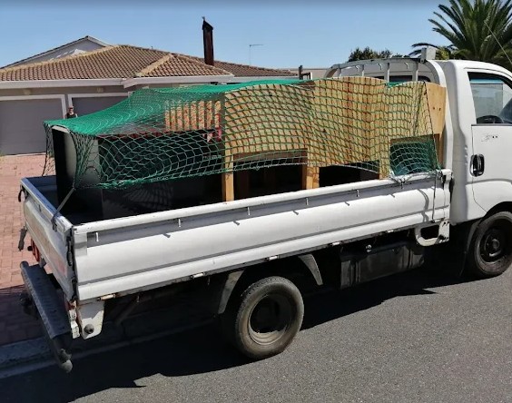FTH Transport truck outside a home in Pinelands