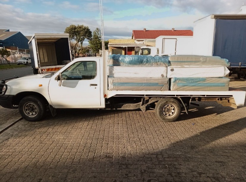FTH Transport moving van transporting furniture